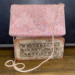 Pink sequined clutch